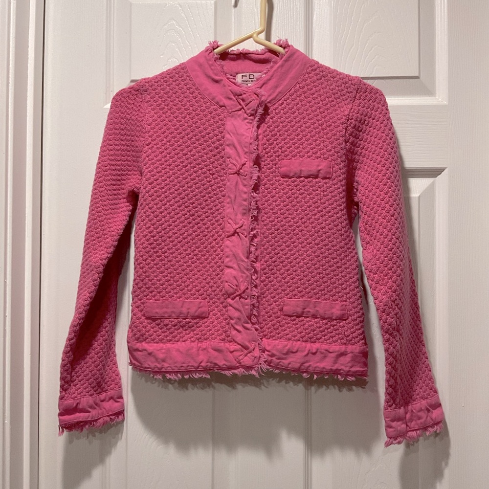 Sweater with fringe trim and snaps in hot pink